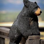 Carved Black Bear climbing