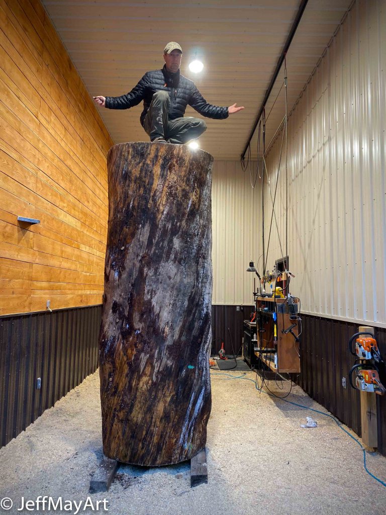 Jeff May standing on Giant Log